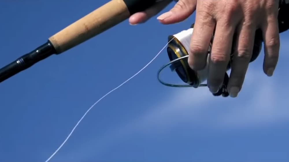 Man casting the Daiwa BG