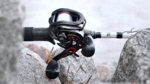 Abu Garcia Revo SX on a pole leaning on a rock