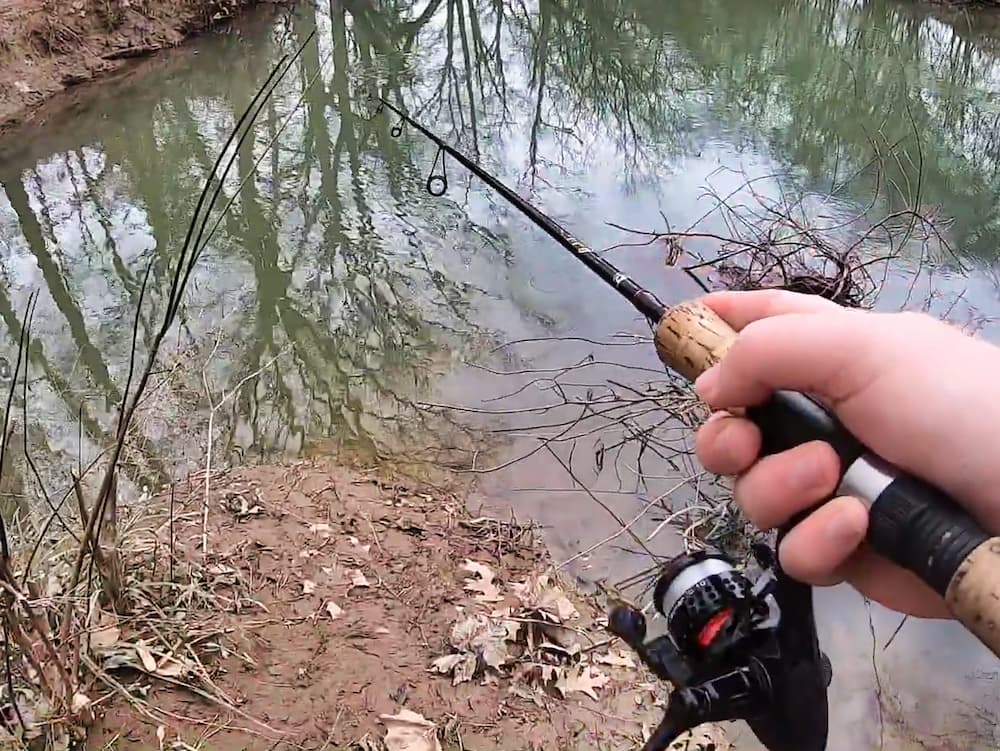Man fishing with the Ceymar spinning reel