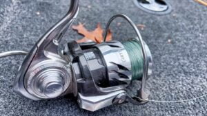 Piscifun Alloy X fishing reel laying on the boat deck