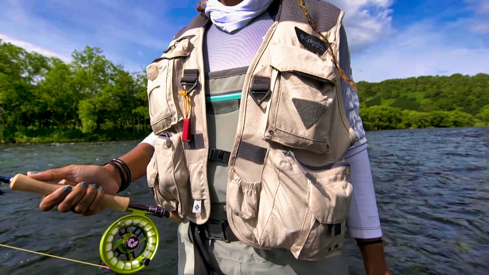 Woman wearing a fishing vest