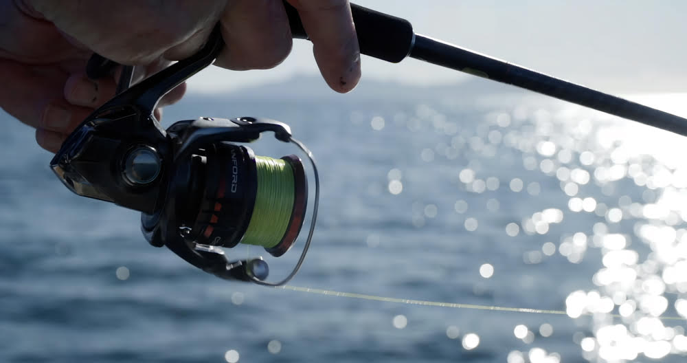 Sporting the Shimano Vanford Spinning Reel while skateboarding.