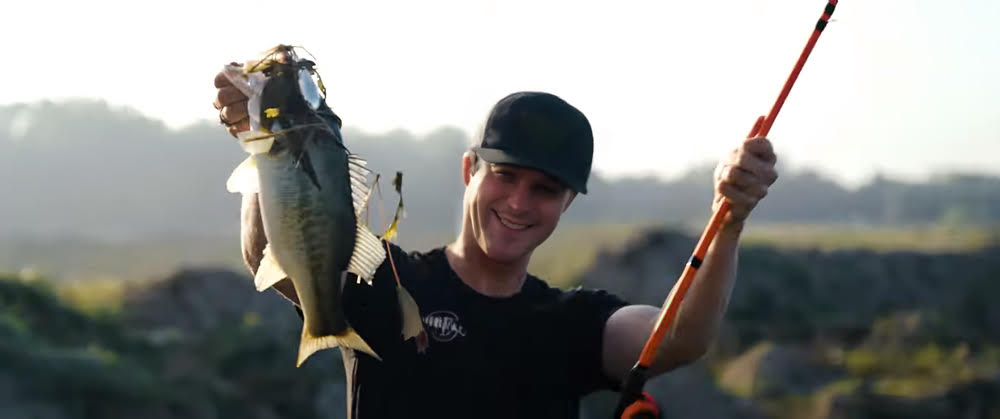 An angler holding a fishing rod during a cold front