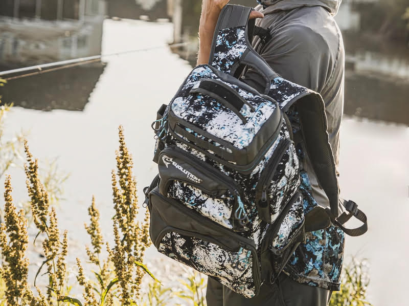A man wearing the Evolution Outdoor Large Mouth Double Decker Backpack