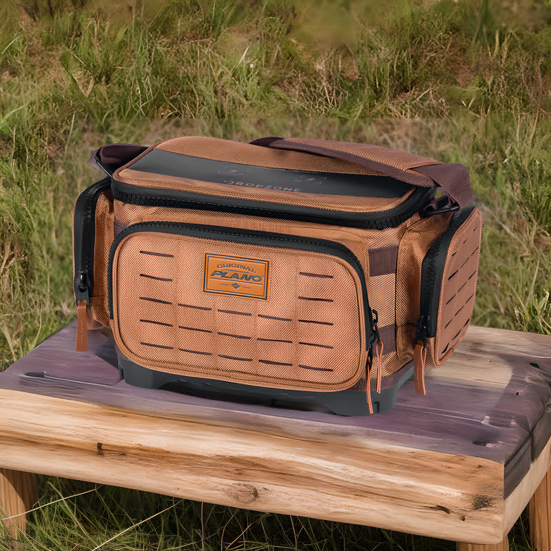 Plano Guide Series Tackle Bag sitting on a wooden bench